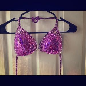 Tamer Marie fuscia hologram figure suit